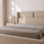 Load image into Gallery viewer, Lumina Wingback Upholstered Bed headboard close-up in beige fabric – illustrative image – Dune &amp; Pine