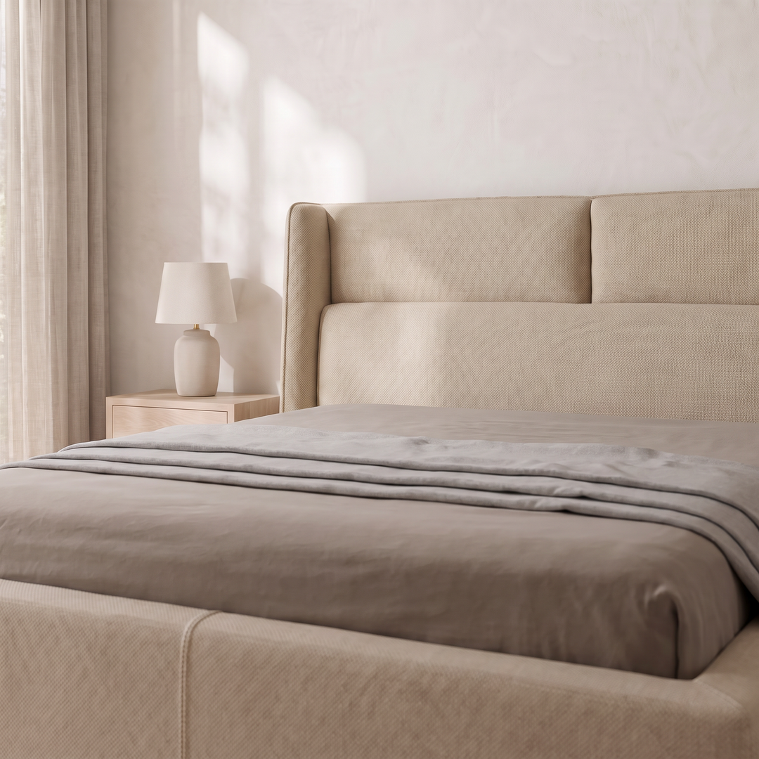 Lumina Wingback Upholstered Bed headboard close-up in beige fabric – illustrative image – Dune & Pine