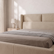 Lumina Wingback Upholstered Bed headboard close-up in beige fabric – illustrative image – Dune & Pine