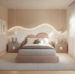 Load image into Gallery viewer, Neatly arranged bedroom with a pink bed and matching headboard.