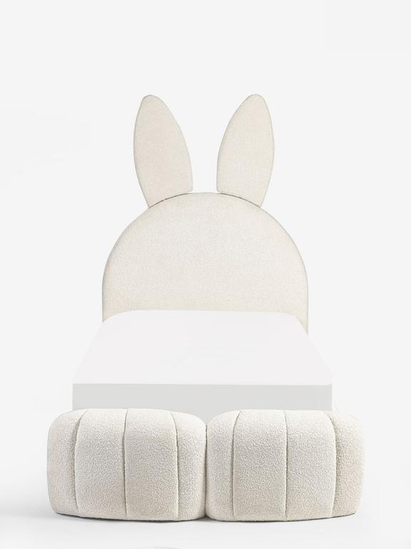 White rabbit-shaped ottoman on a white background