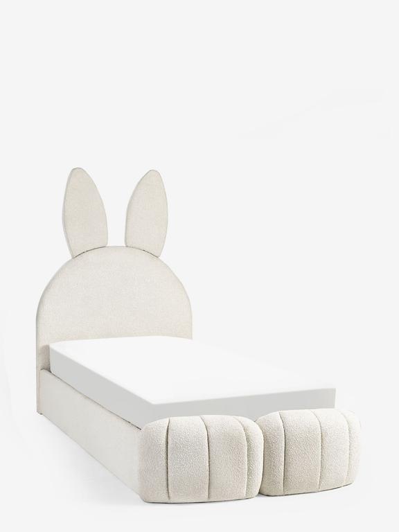 Children's bed with rabbit ears and two cushions on a white background