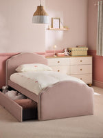 Load image into Gallery viewer, Children's bedroom with a pink bed and dresser.