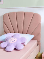 Load image into Gallery viewer, Pink chair with a purple plush toy on a light green wall background